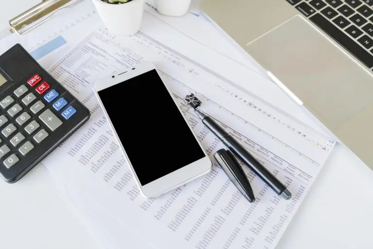 desk office accountant with calculator smartphone